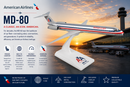 Model of an American Airlines MD-80 airplane on a stand with sunset background