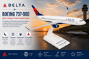 Model airplane on a stand with Delta branding against a sunset airport backdrop