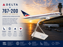 Delta 767-200 model airplane with sunset at an airport in the background