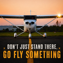 Small airplane on a runway with a sunset background and motivational text.
