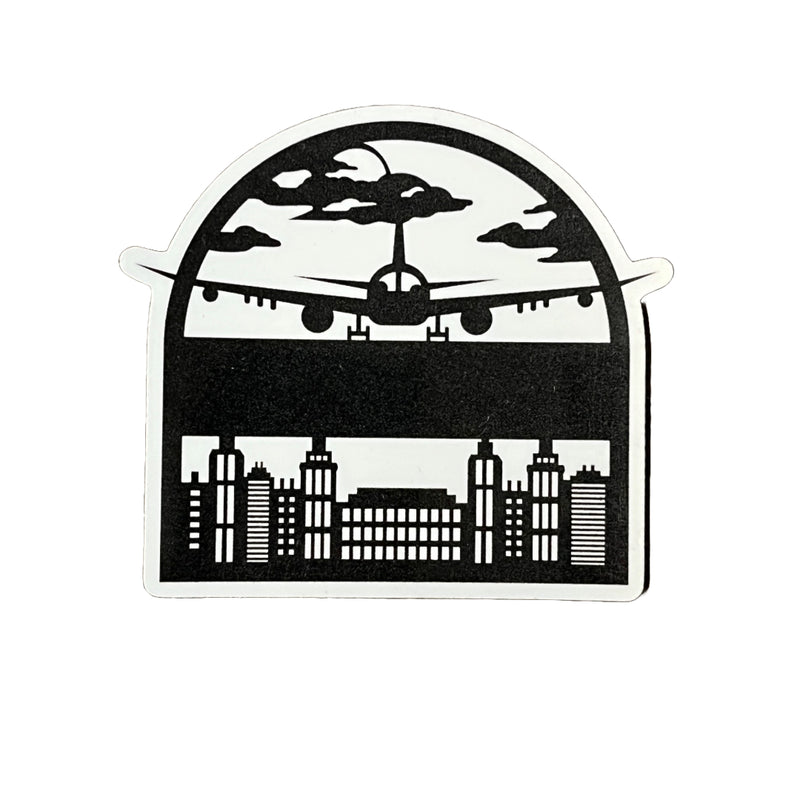 Aircraft Over Cityscape Sticker