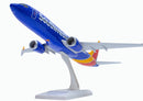 Model airplane with Southwest Airlines livery on a white background