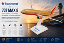 Southwest 737 MAX 8 model airplane with sunset and airport background