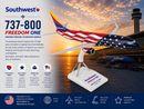 Southwest Airlines model airplane on a stand with sunset airport background