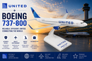 Model airplane of United Airlines Boeing 737-800 with sunset airport background