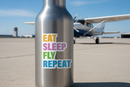 Eat Sleep Fly Repeat sticker on stainless steel water bottle at airport