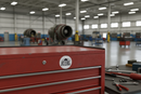 F-15 Eagle sticker on toolbox in maintenance hangar