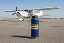 Warning Badass Flight Instructor CFI sticker on a navy blue water bottle on the airport ramp with a Diamond DA-20 in the background