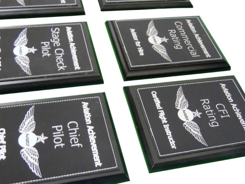 close-up of aviation achievement plaques
